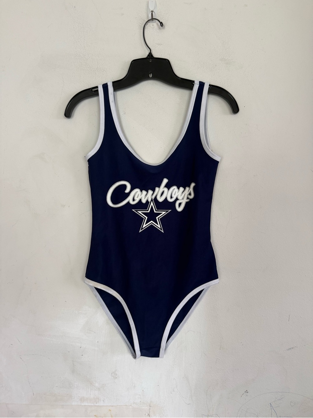NFL Apparel Womens Dallas Cowboys Spellout One Piece Bodysuit, Size Small